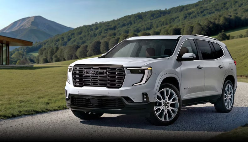 White GMC SUV parked in the driveway